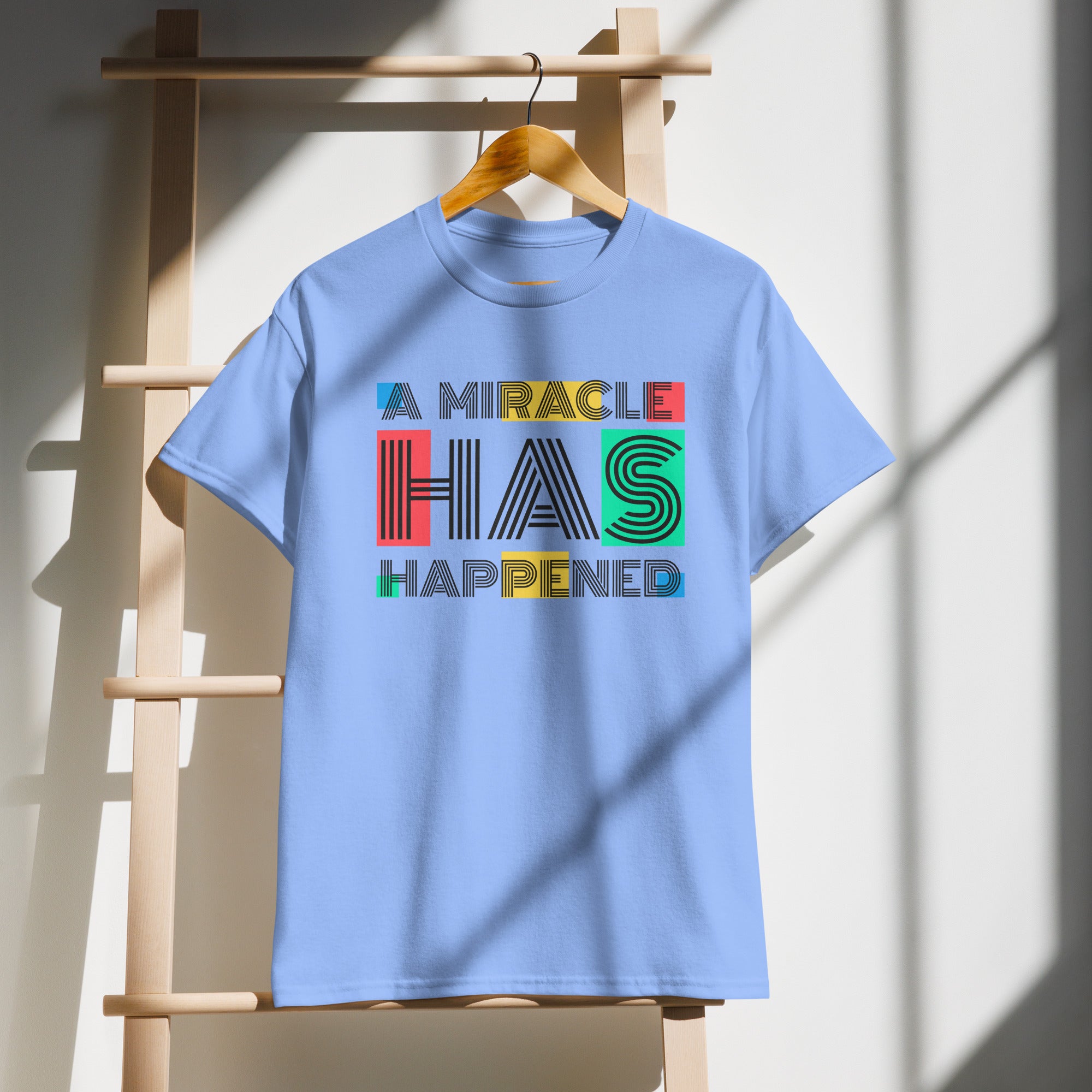 Unisex Graphic T-Shirt – “A Miracle Has Happened”