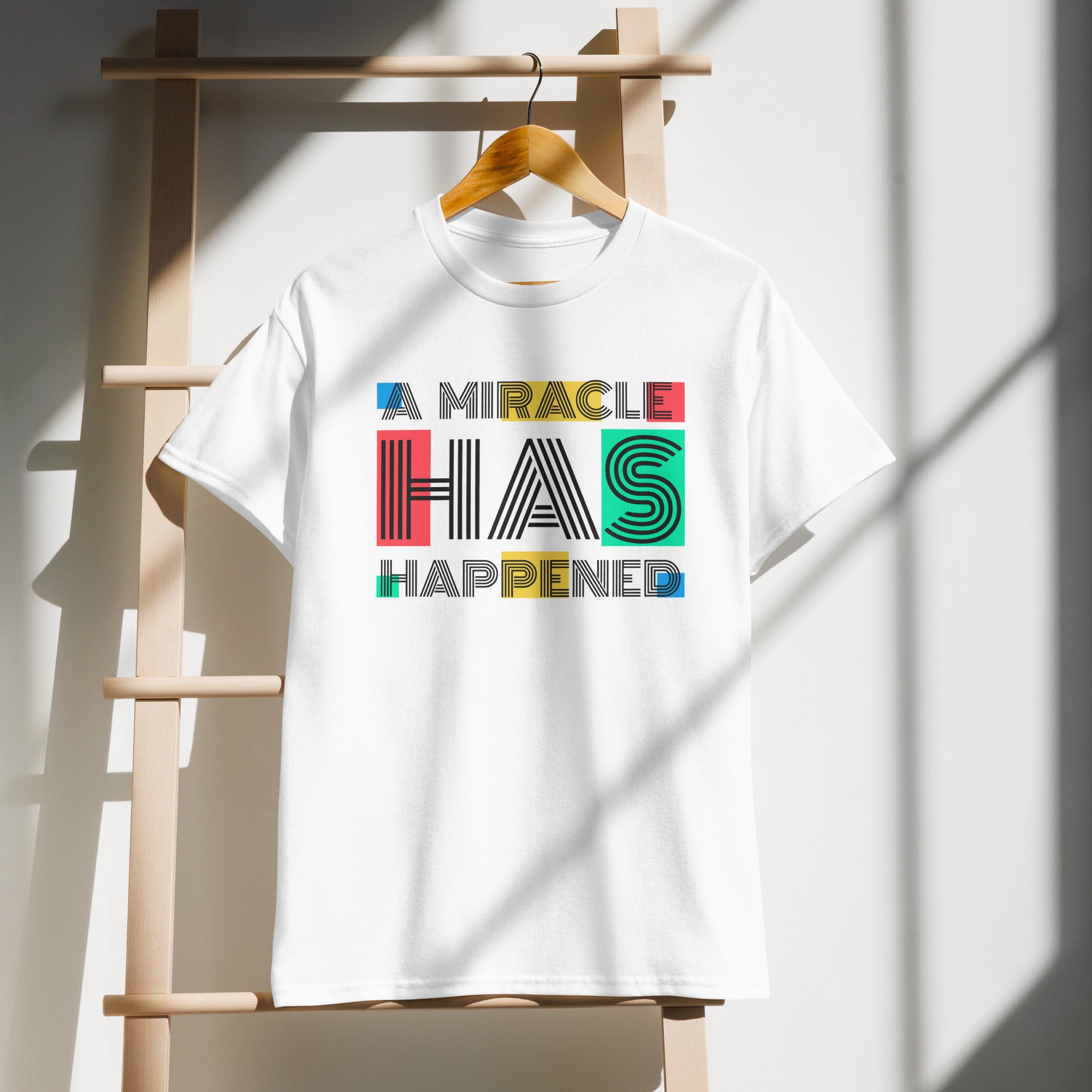 Unisex Graphic T-Shirt – “A Miracle Has Happened”