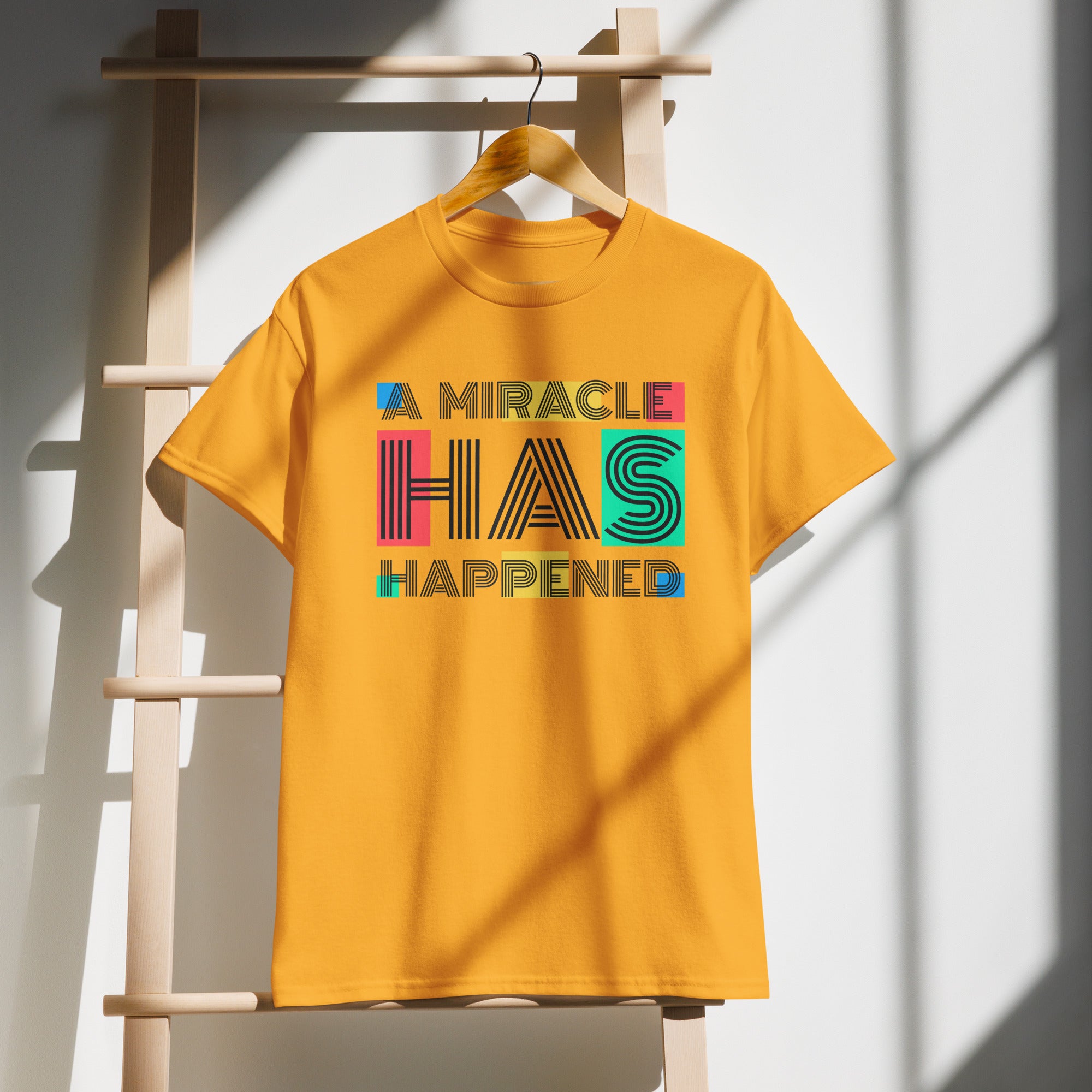 Unisex Graphic T-Shirt – “A Miracle Has Happened”