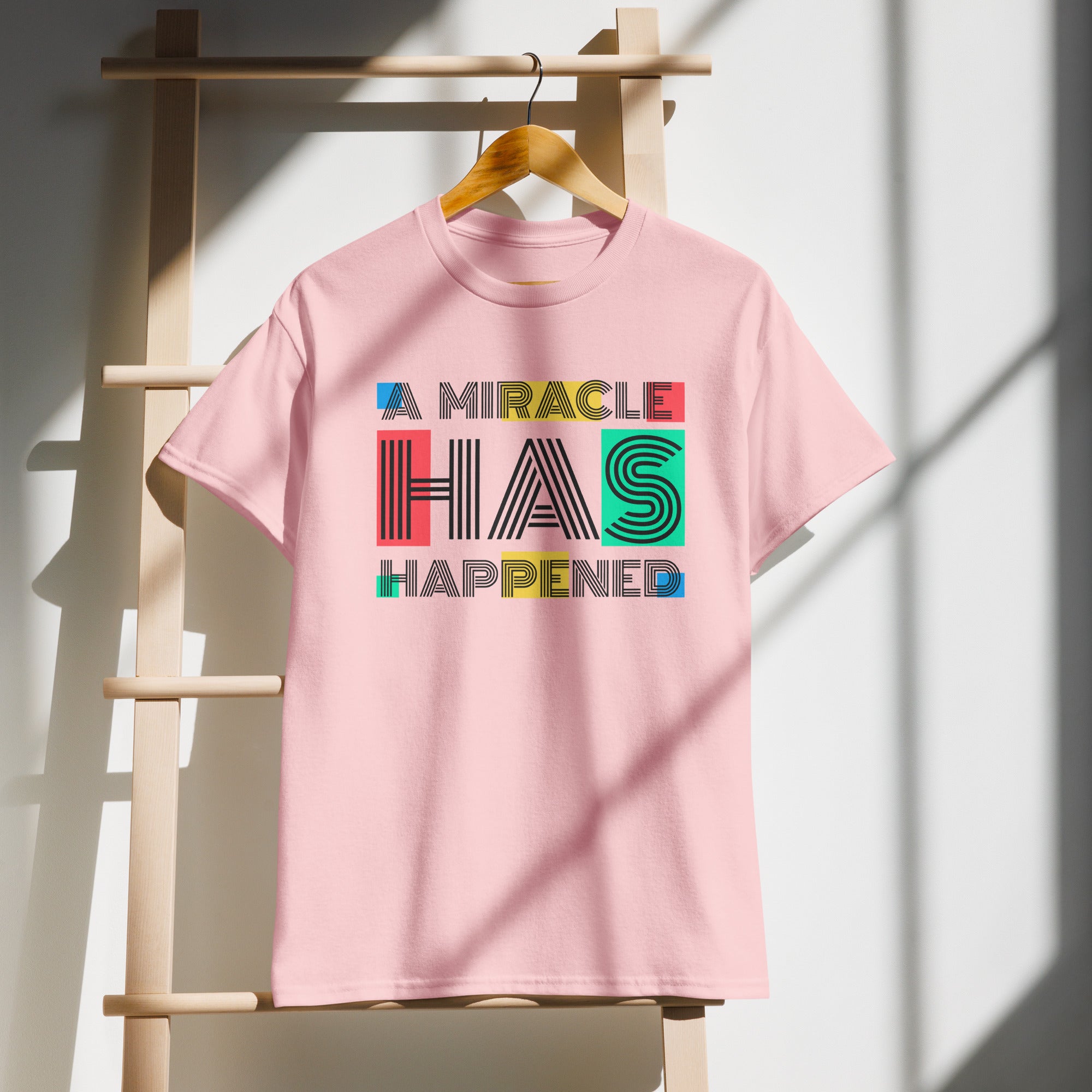 Unisex Graphic T-Shirt – “A Miracle Has Happened”